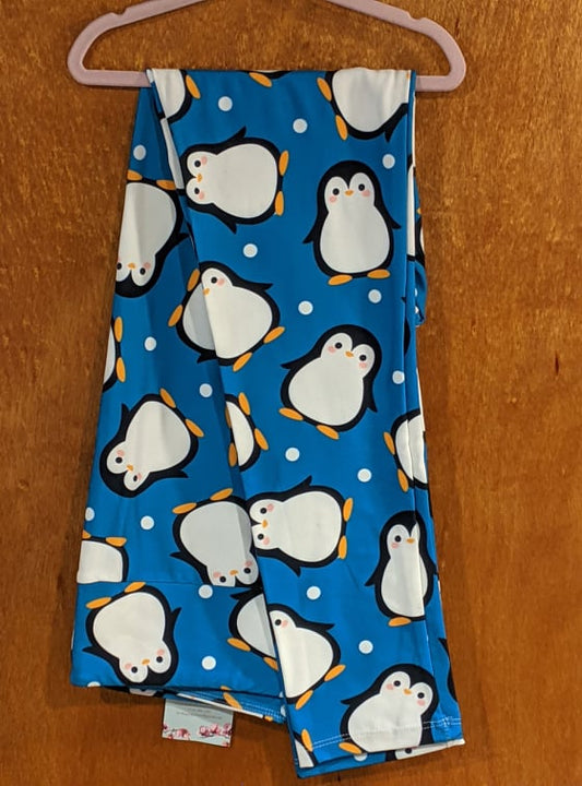 Penguins on blue